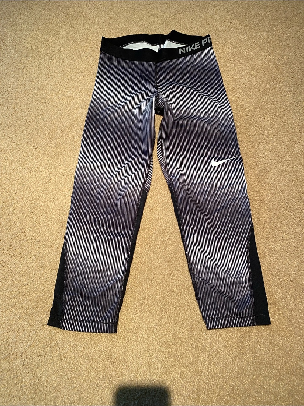 Cropped Nike Womens Black and Gray Striped Performance Leggings
